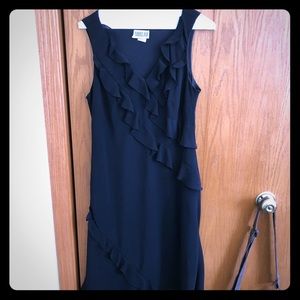 Black sleeveless dress with ruffles